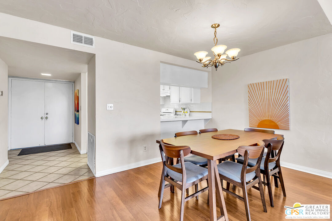 28 Calle Encinitas Rancho Mirage, CA 92270 - Photo 35 of 57 a view of a dining room with furniture and chandelier