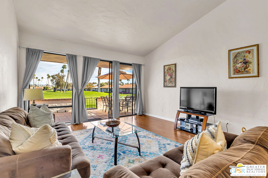 28 Calle Encinitas Rancho Mirage, CA 92270 - Photo 4 of 57 a living room with furniture and a flat screen tv