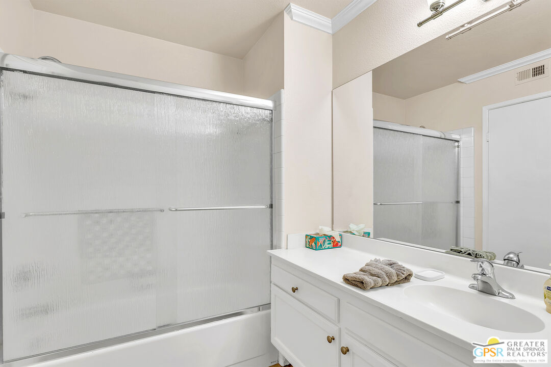 28 Calle Encinitas Rancho Mirage, CA 92270 - Photo 44 of 57 a bathroom with a sink and a mirror