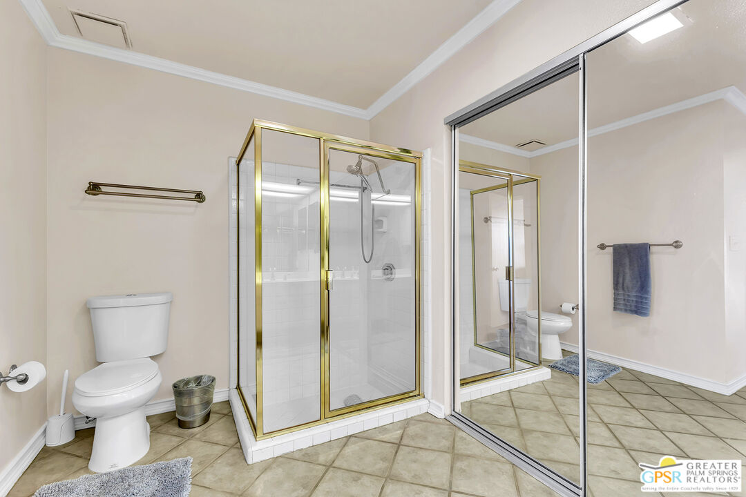 28 Calle Encinitas Rancho Mirage, CA 92270 - Photo 48 of 57 a bathroom with a toilet and a shower