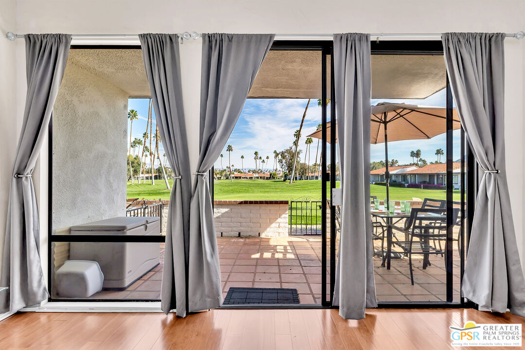 28 Calle Encinitas Rancho Mirage, CA 92270 - Photo 49 of 57 a view of an entryway with a floor to ceiling window
