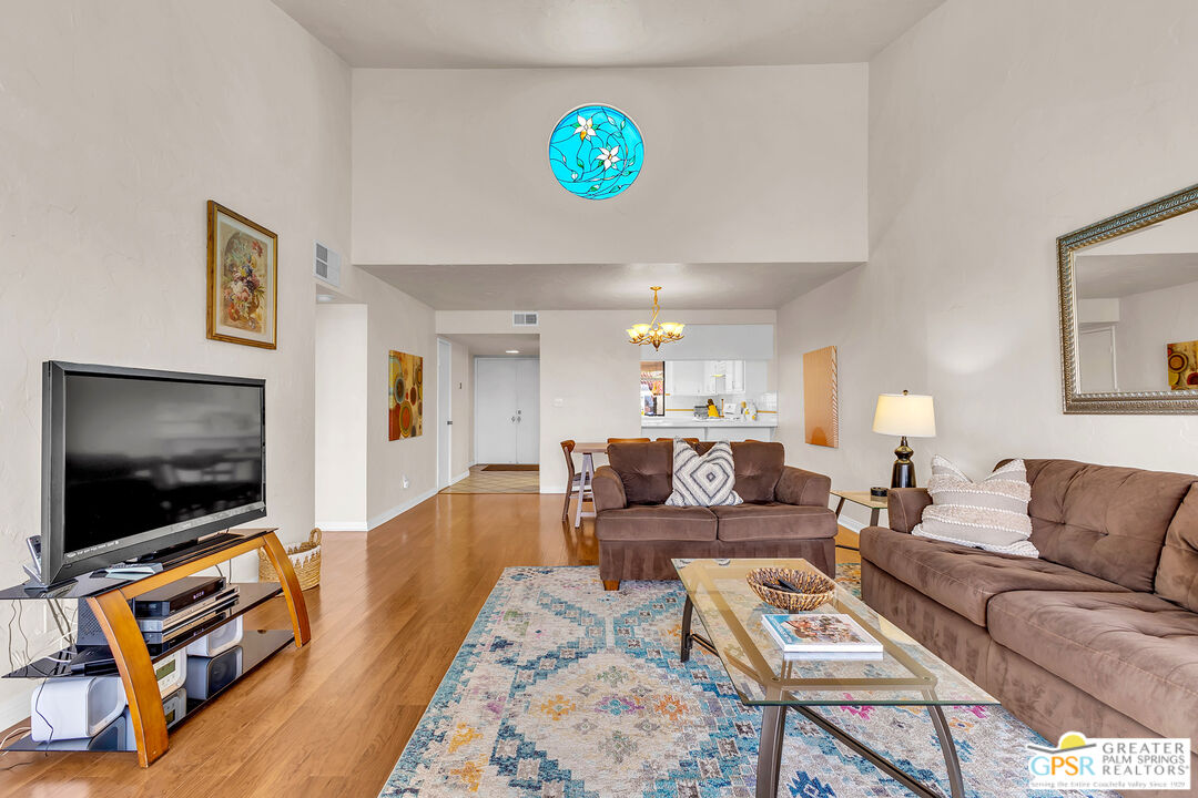 28 Calle Encinitas Rancho Mirage, CA 92270 - Photo 5 of 57 a living room with furniture and a flat screen tv