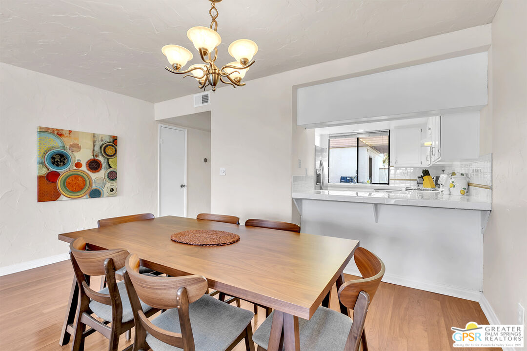 28 Calle Encinitas Rancho Mirage, CA 92270 - Photo 6 of 57 a view of a dining room with furniture and chandelier