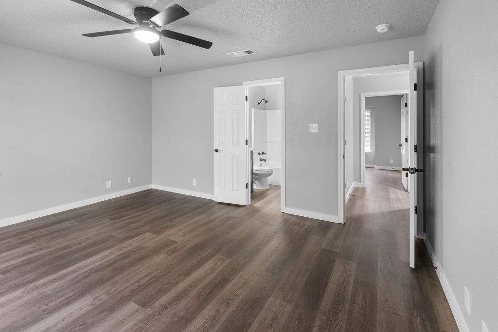 709 East Crawford Street Denison, TX 75021 - Photo 11 of 13 a view of empty room with wooden floor