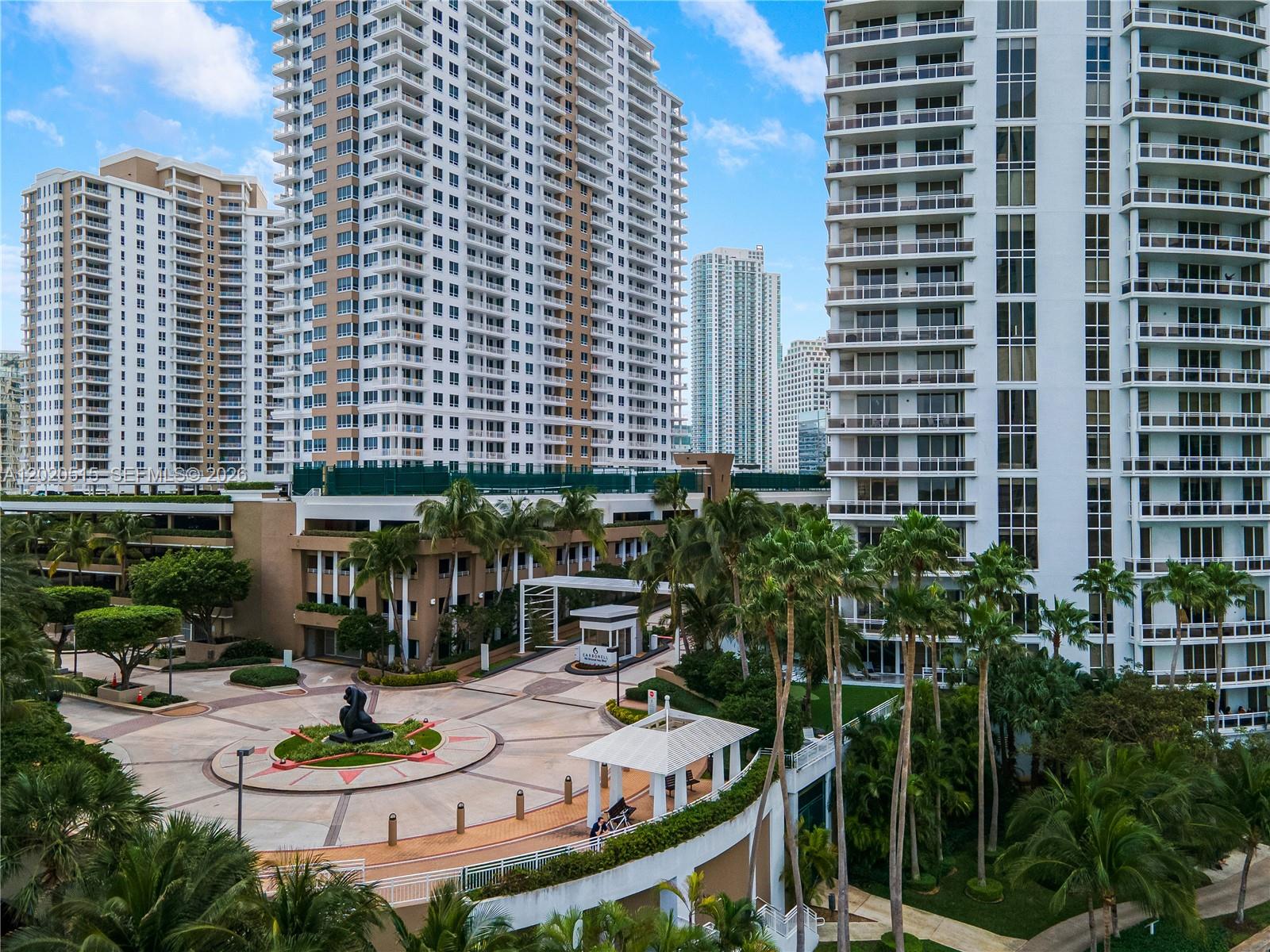 901 Brickell Key Boulevard, Unit 609 Miami, FL 33131 - Photo 24 of 27 Guarded entrance to building