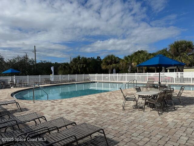 5632 Talbot Boulevard Cocoa, FL 32926 - Photo 11 of 12 swimming pool view with a seating space