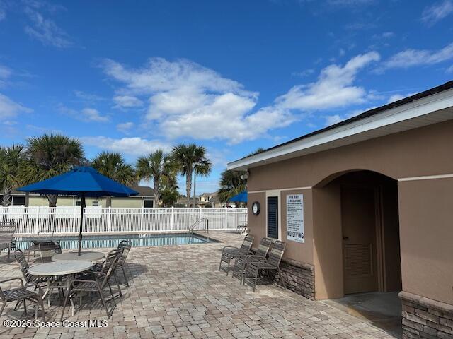 5632 Talbot Boulevard Cocoa, FL 32926 - Photo 12 of 12 a backyard of a house with table and chairs