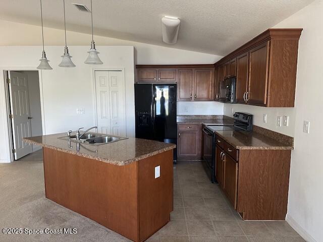 5632 Talbot Boulevard Cocoa, FL 32926 - Photo 2 of 12 a kitchen with kitchen island a stove a refrigerator a sink and dishwasher