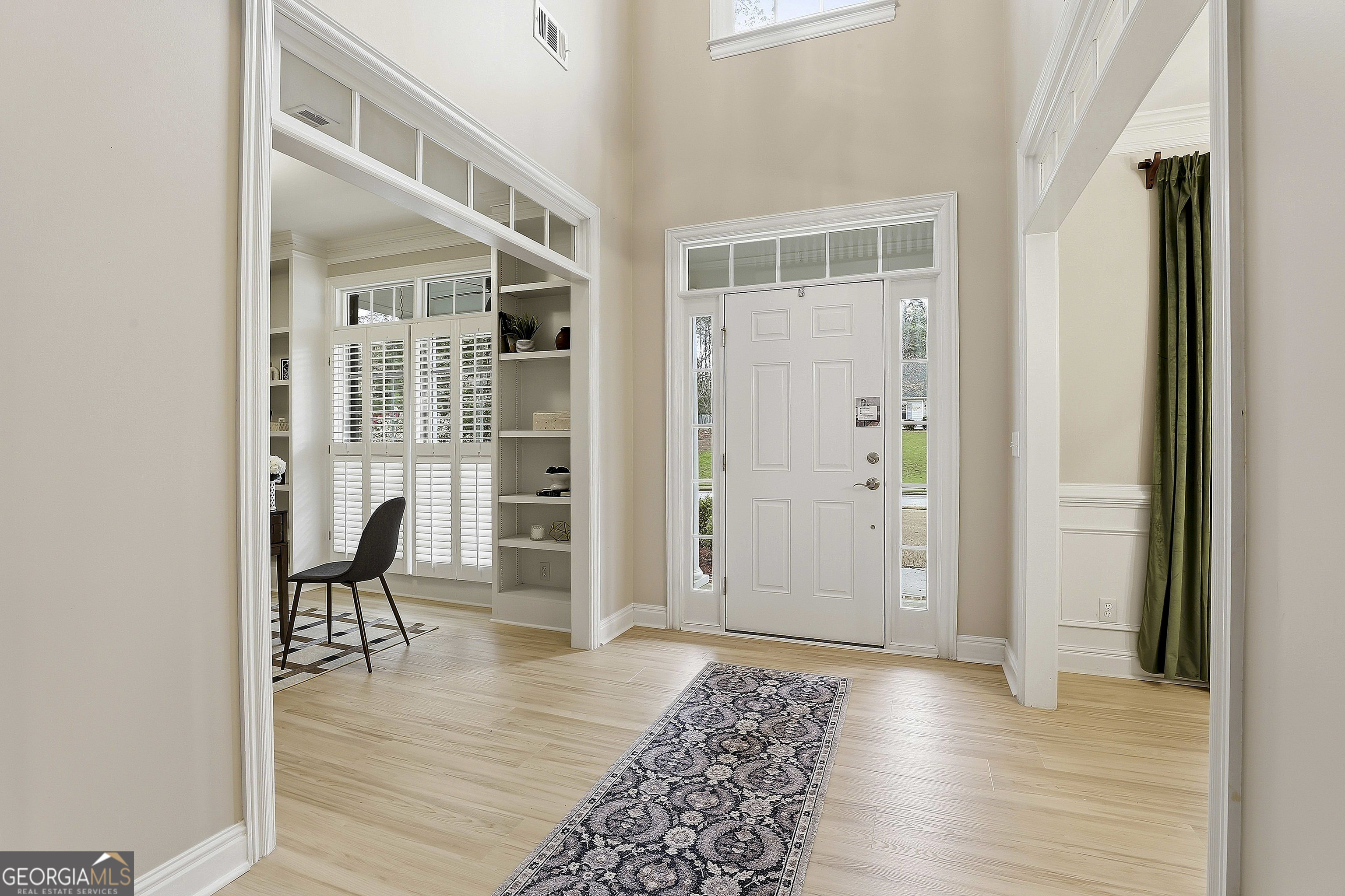 108 Tullamore Trail Tyrone, GA 30290 - Photo 11 of 54 a view of a livingroom with furniture and wooden floor