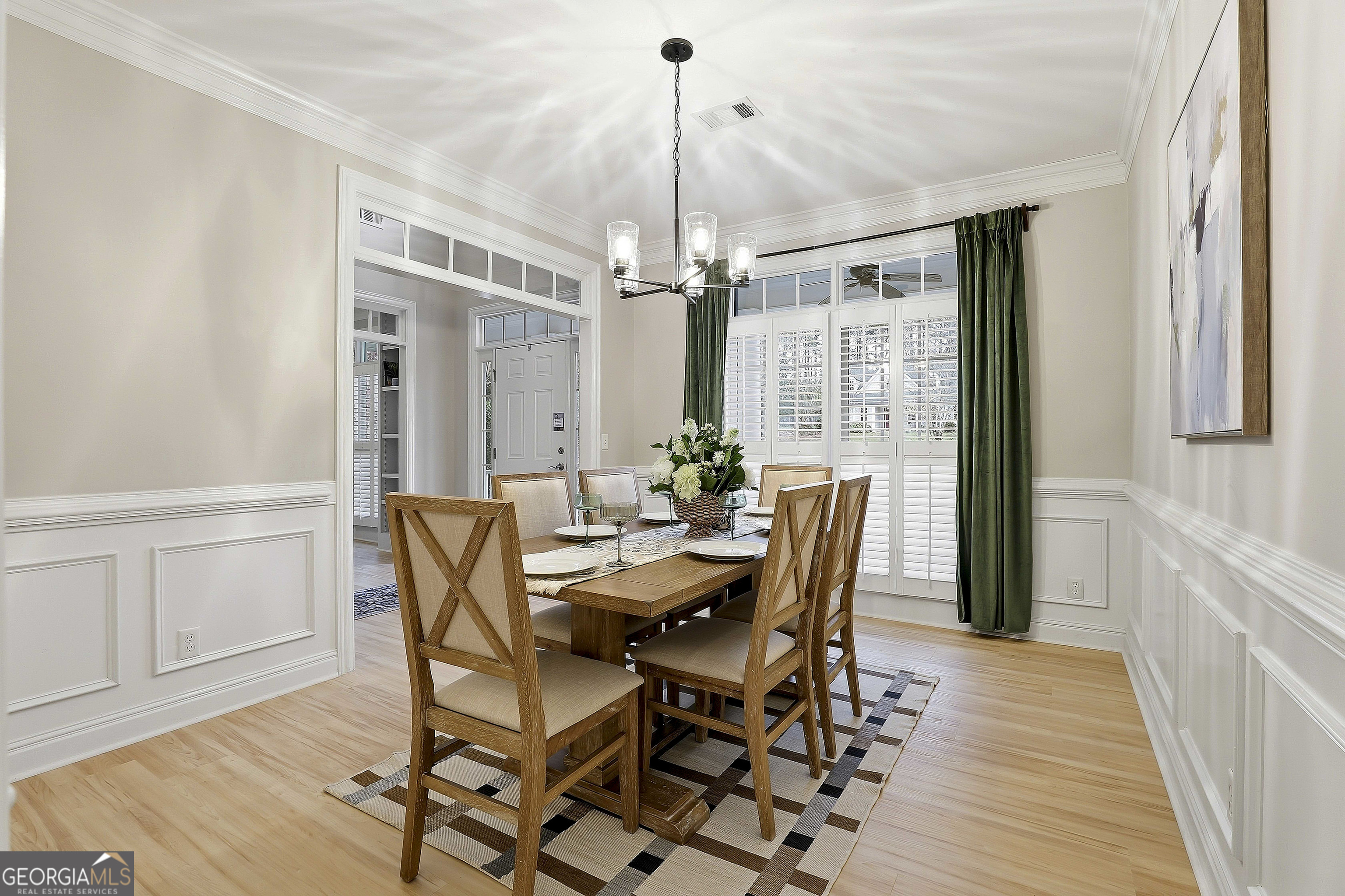 108 Tullamore Trail Tyrone, GA 30290 - Photo 16 of 54 a view of a dining room with furniture window and wooden floor