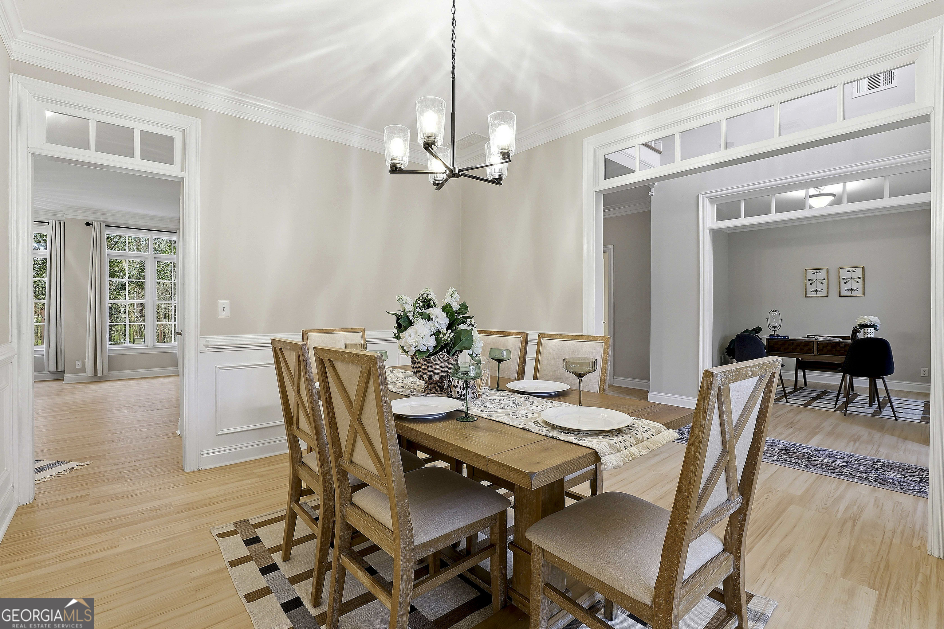 108 Tullamore Trail Tyrone, GA 30290 - Photo 17 of 54 a view of a dining room with furniture window and wooden floor