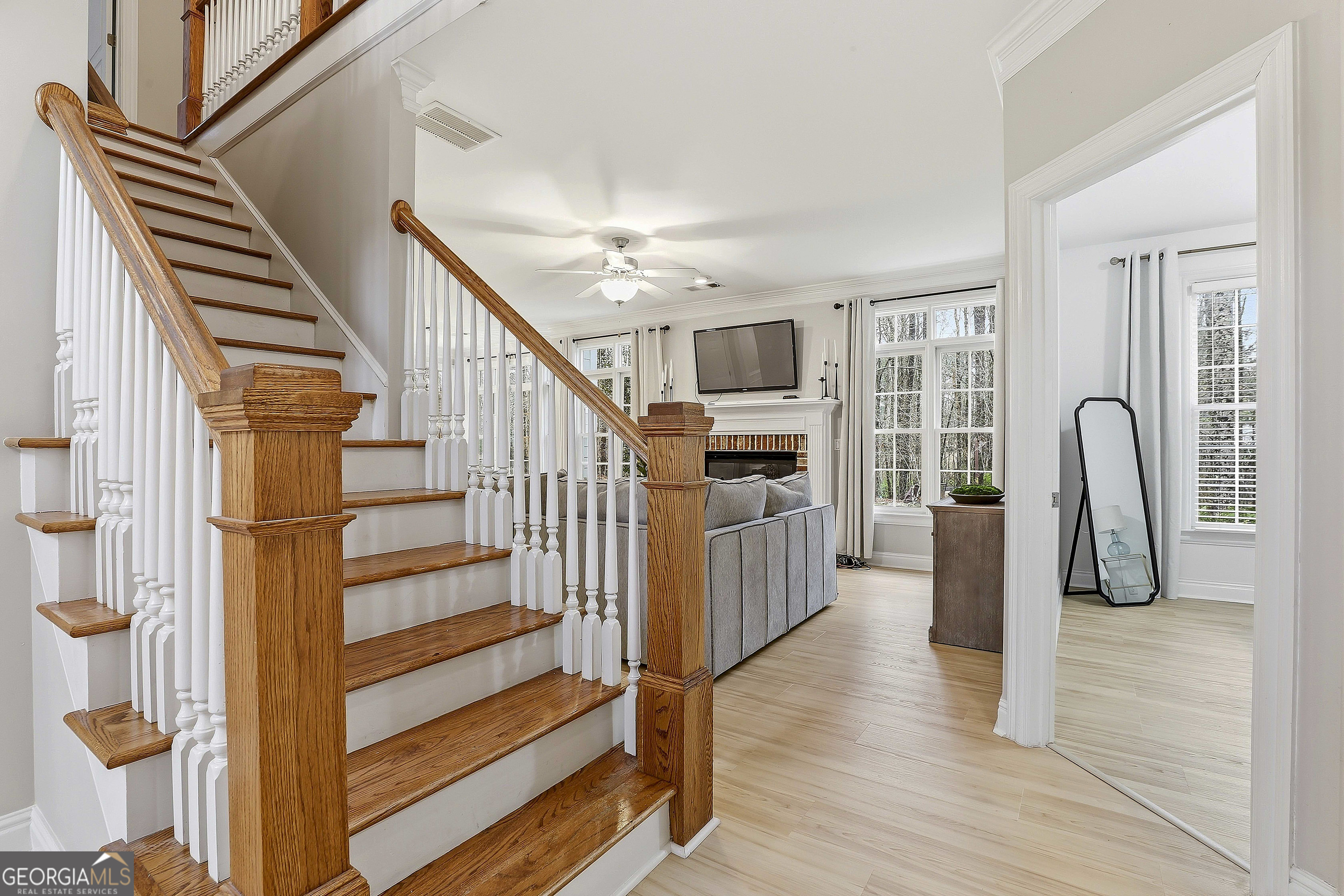 108 Tullamore Trail Tyrone, GA 30290 - Photo 18 of 54 a view of entryway and hall with wooden floor