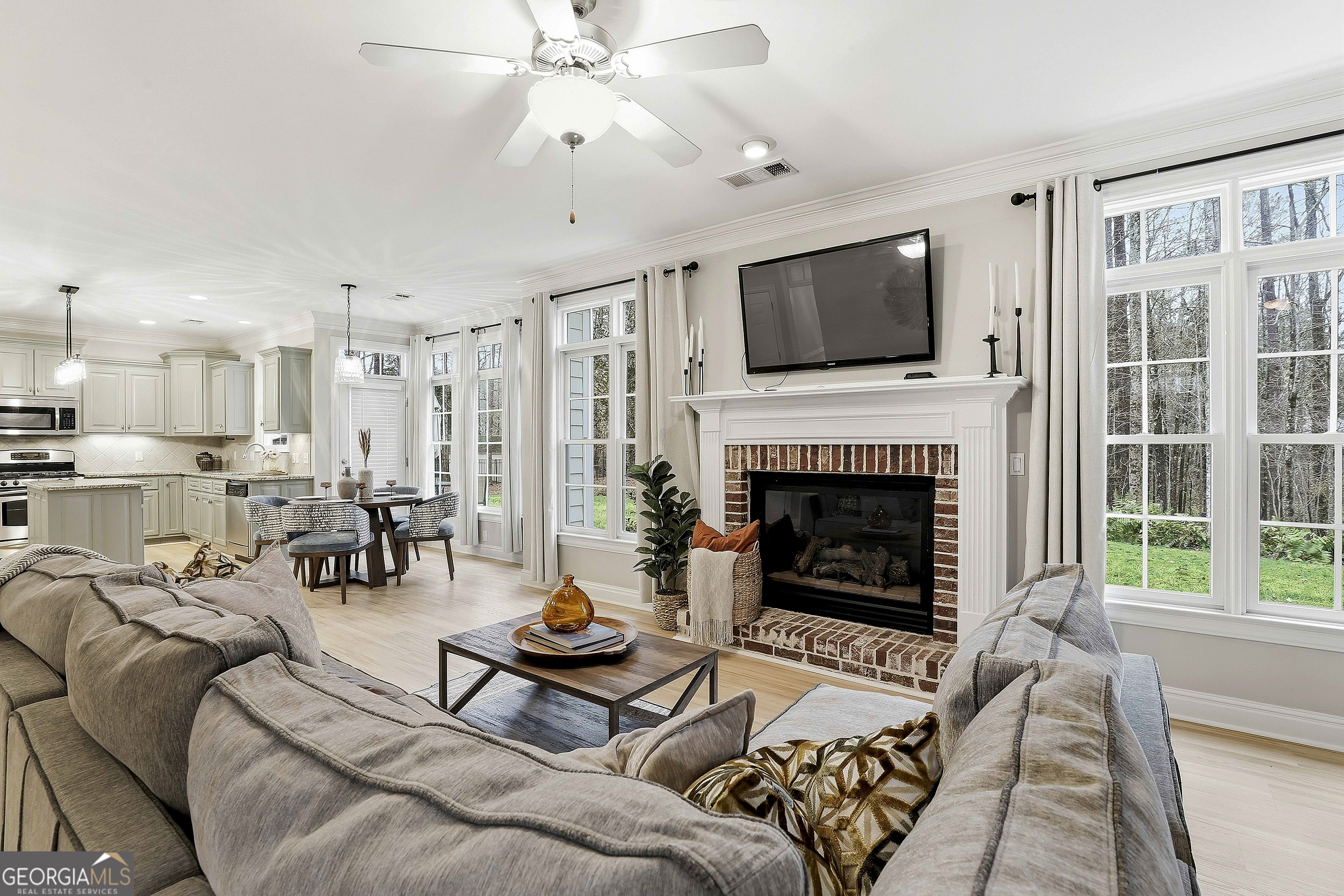 108 Tullamore Trail Tyrone, GA 30290 - Photo 20 of 54 a living room with furniture fireplace and flat screen tv