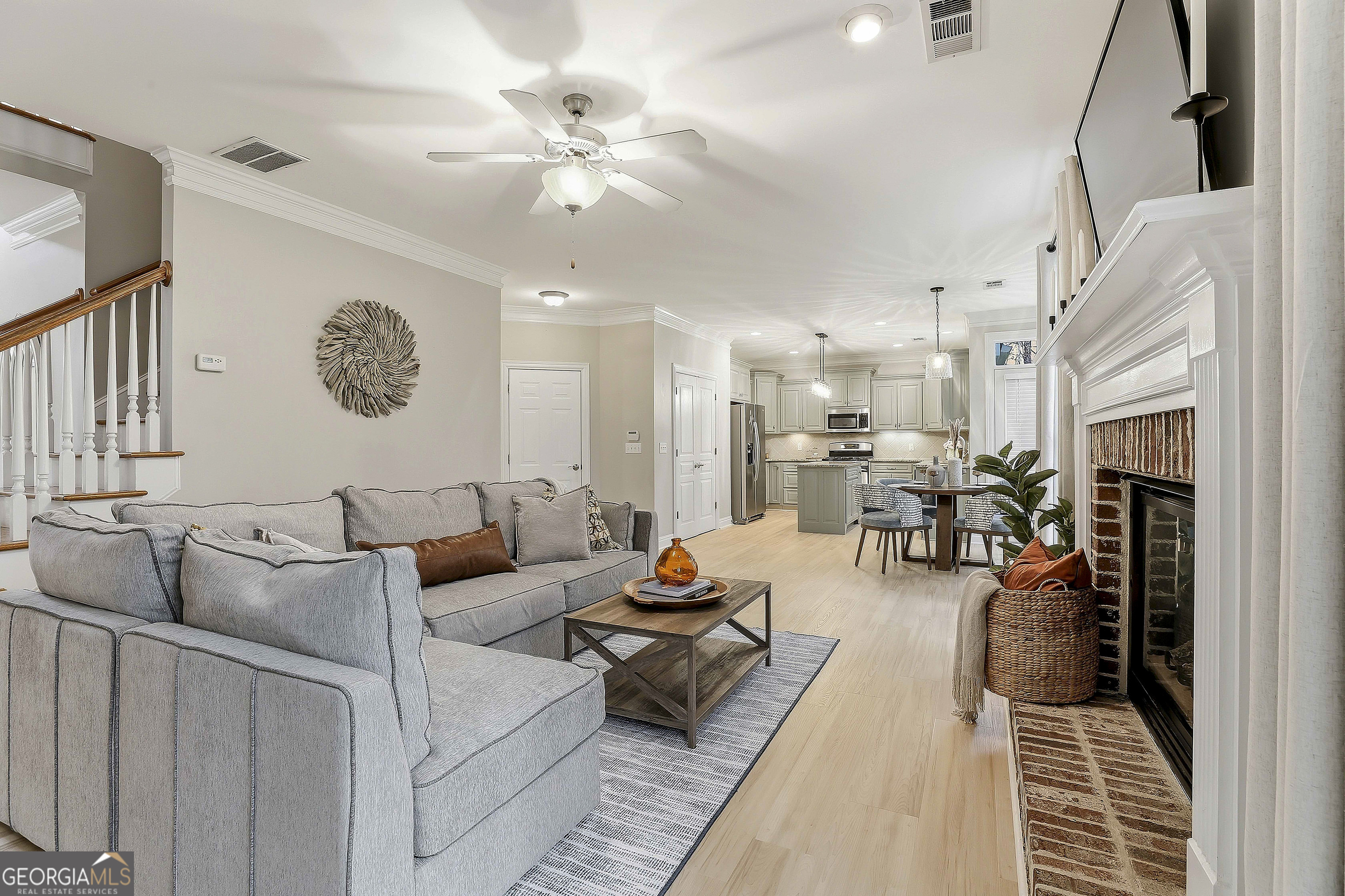 108 Tullamore Trail Tyrone, GA 30290 - Photo 21 of 54 a living room with furniture and a fireplace