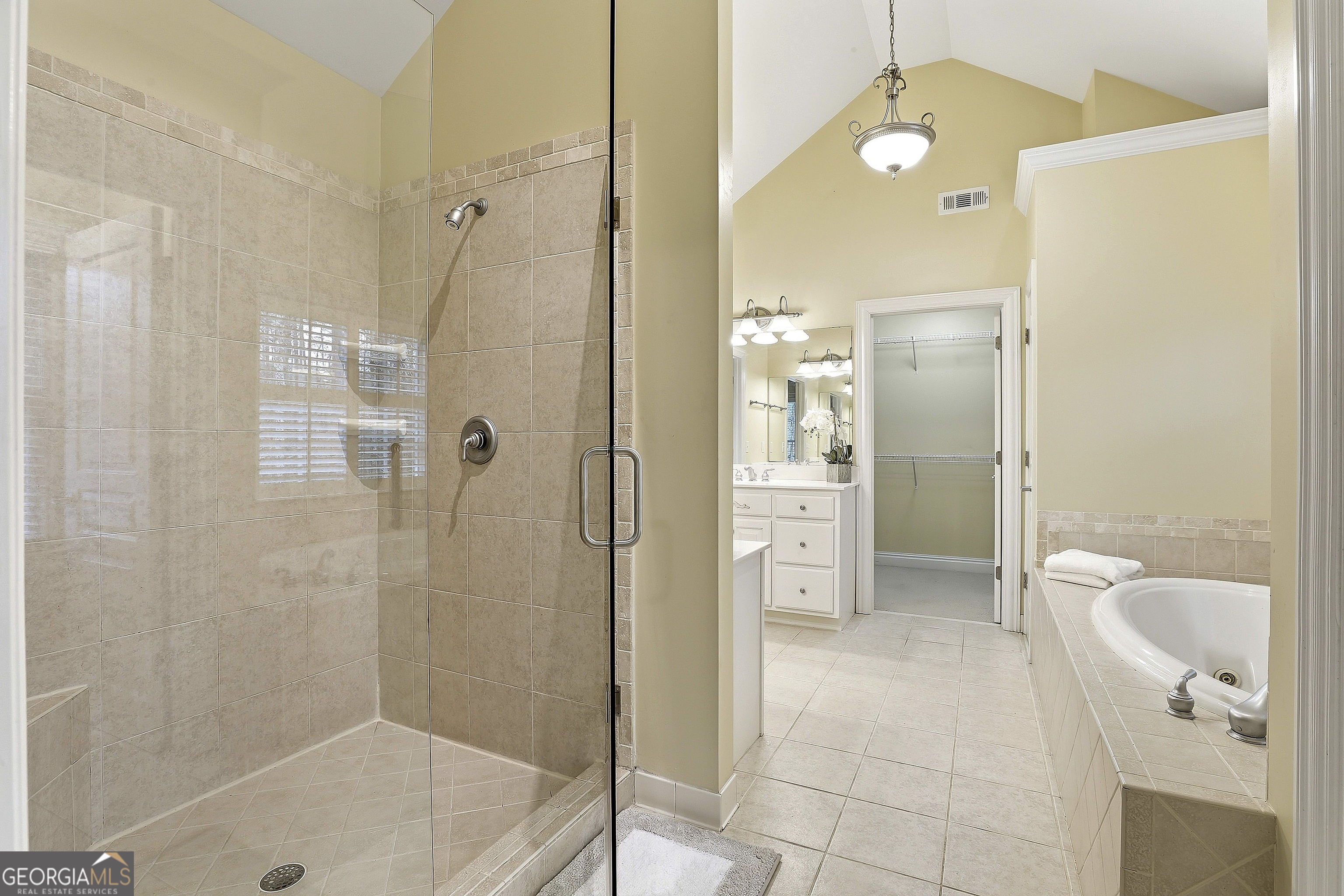 108 Tullamore Trail Tyrone, GA 30290 - Photo 40 of 54 a bathroom with a glass shower door and a sink