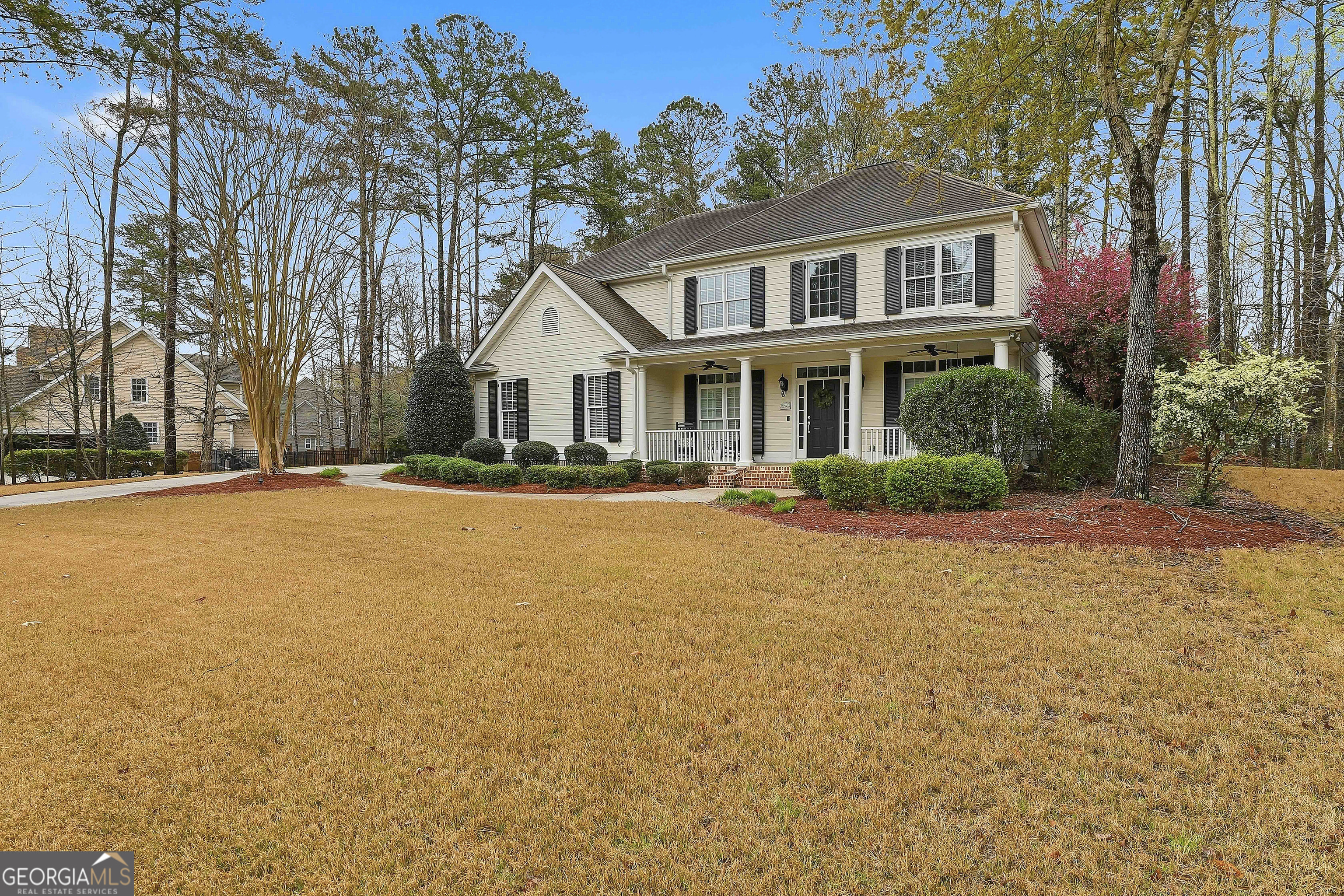 108 Tullamore Trail Tyrone, GA 30290 - Photo 4 of 54 a front view of house with yard and trees around