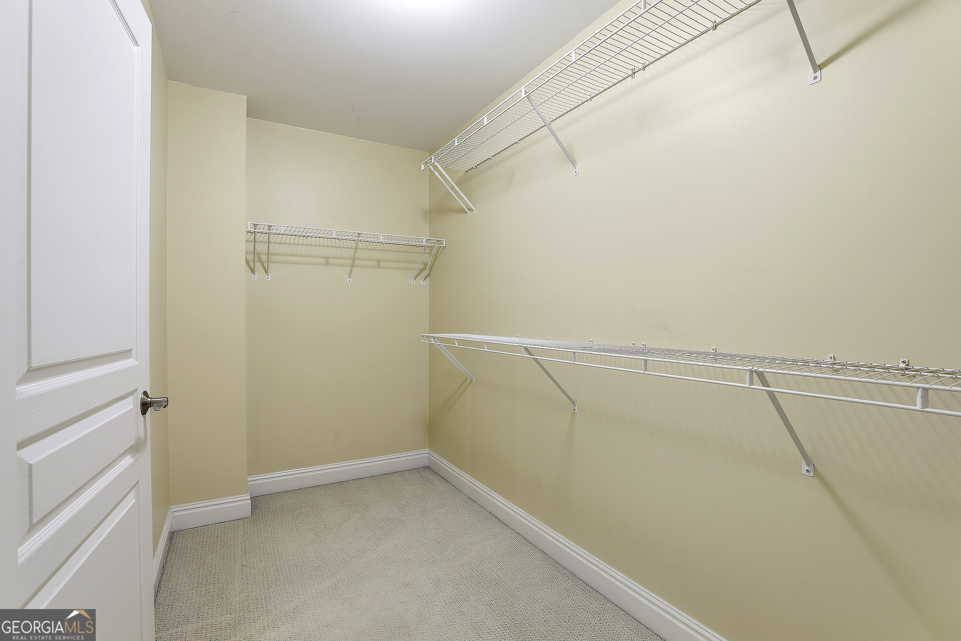 108 Tullamore Trail Tyrone, GA 30290 - Photo 41 of 54 a view of a room with racks on the wall