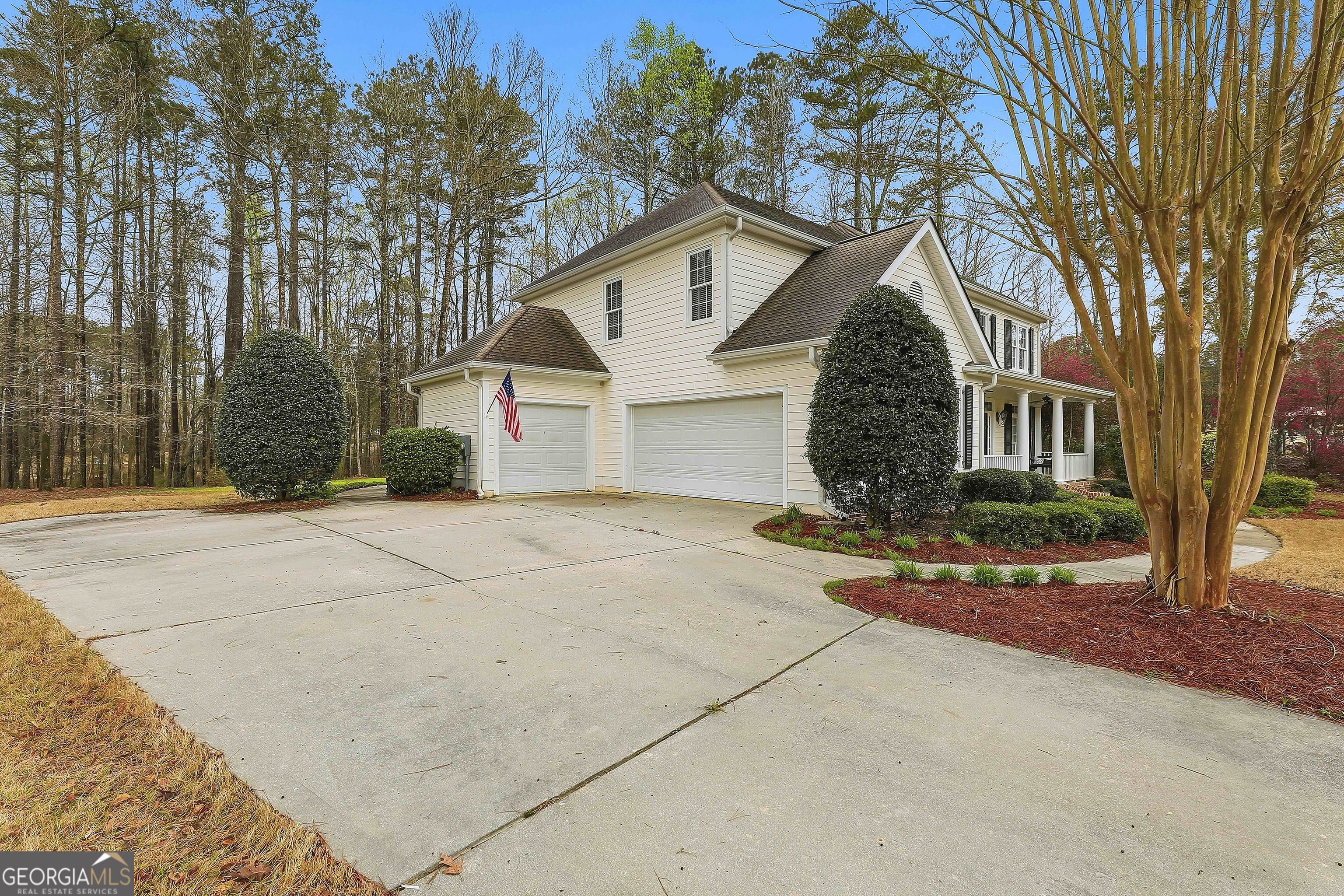 108 Tullamore Trail Tyrone, GA 30290 - Photo 6 of 54 a view of a house with a yard and large trees