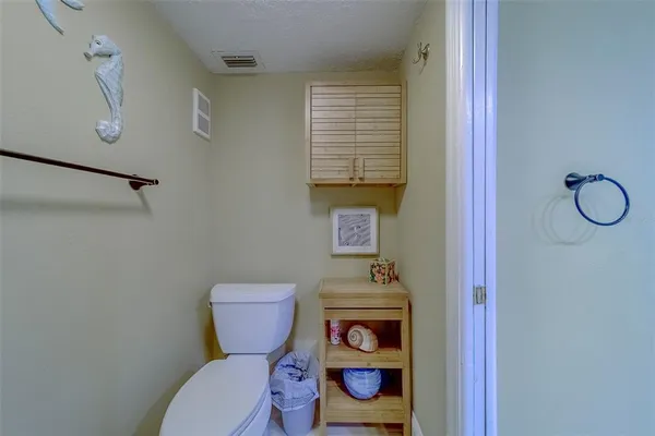 a bathroom with a sink a toilet and a bathtub