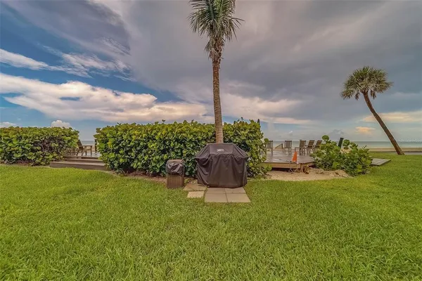 a picture of a bench in front of a wall