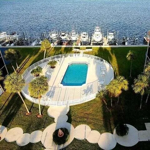 an aerial view of a house with outdoor space