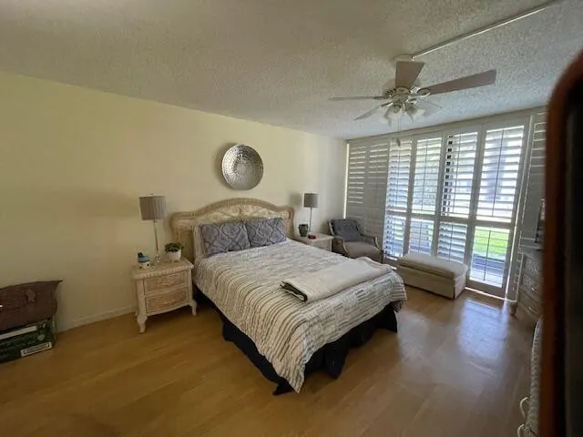 a bathroom with a toilet a sink and a shower