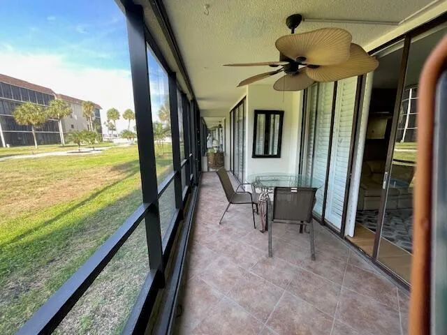 a bedroom with a bed and a table in it