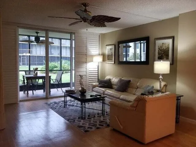 a bedroom with a bed and a flat tv screen