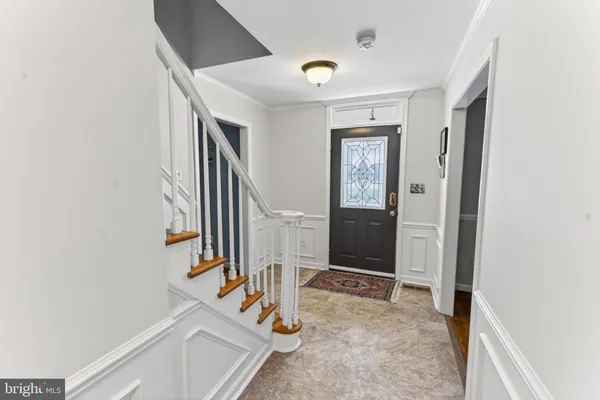 a view of an entryway with staircase