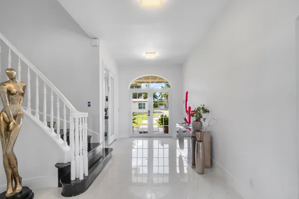 a view of entryway with wooden floor
