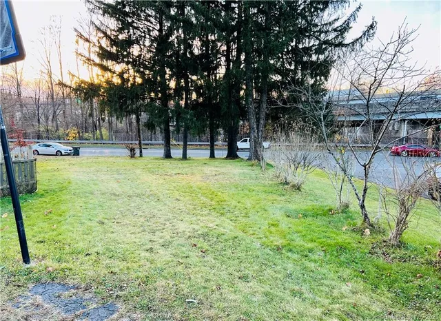 a view of a yard with a slide