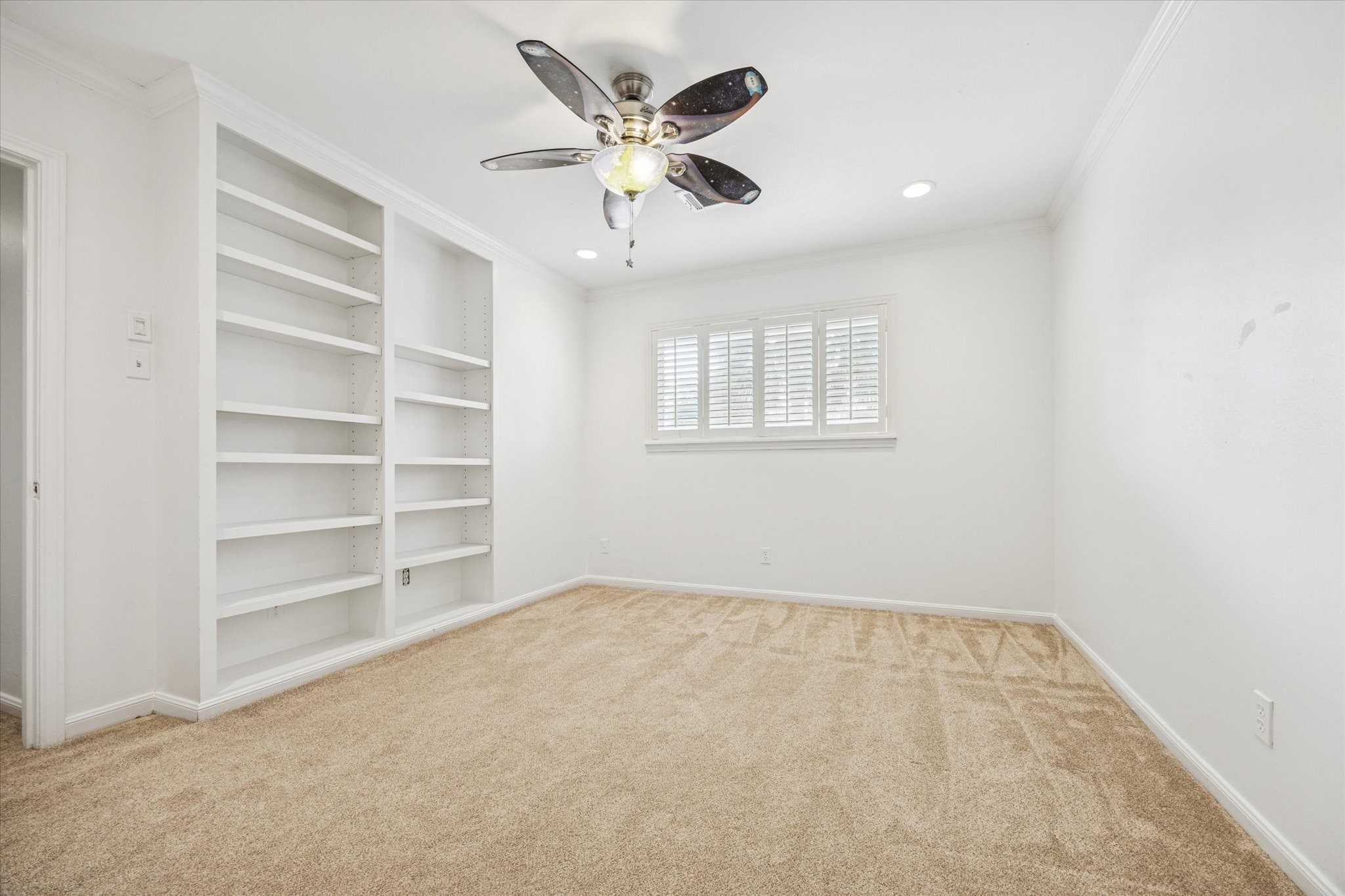13403 Taylorcrest Road Houston, TX 77079 - Photo 18 of 38 a view of an empty room with a window