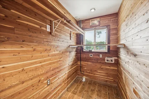a view of balcony with wooden floor