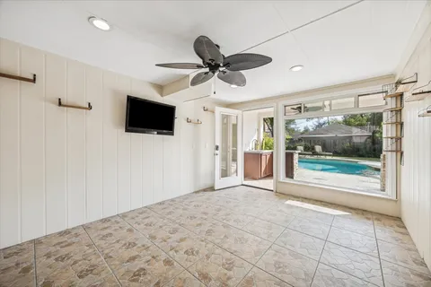 a view of a livingroom with a flat screen tv