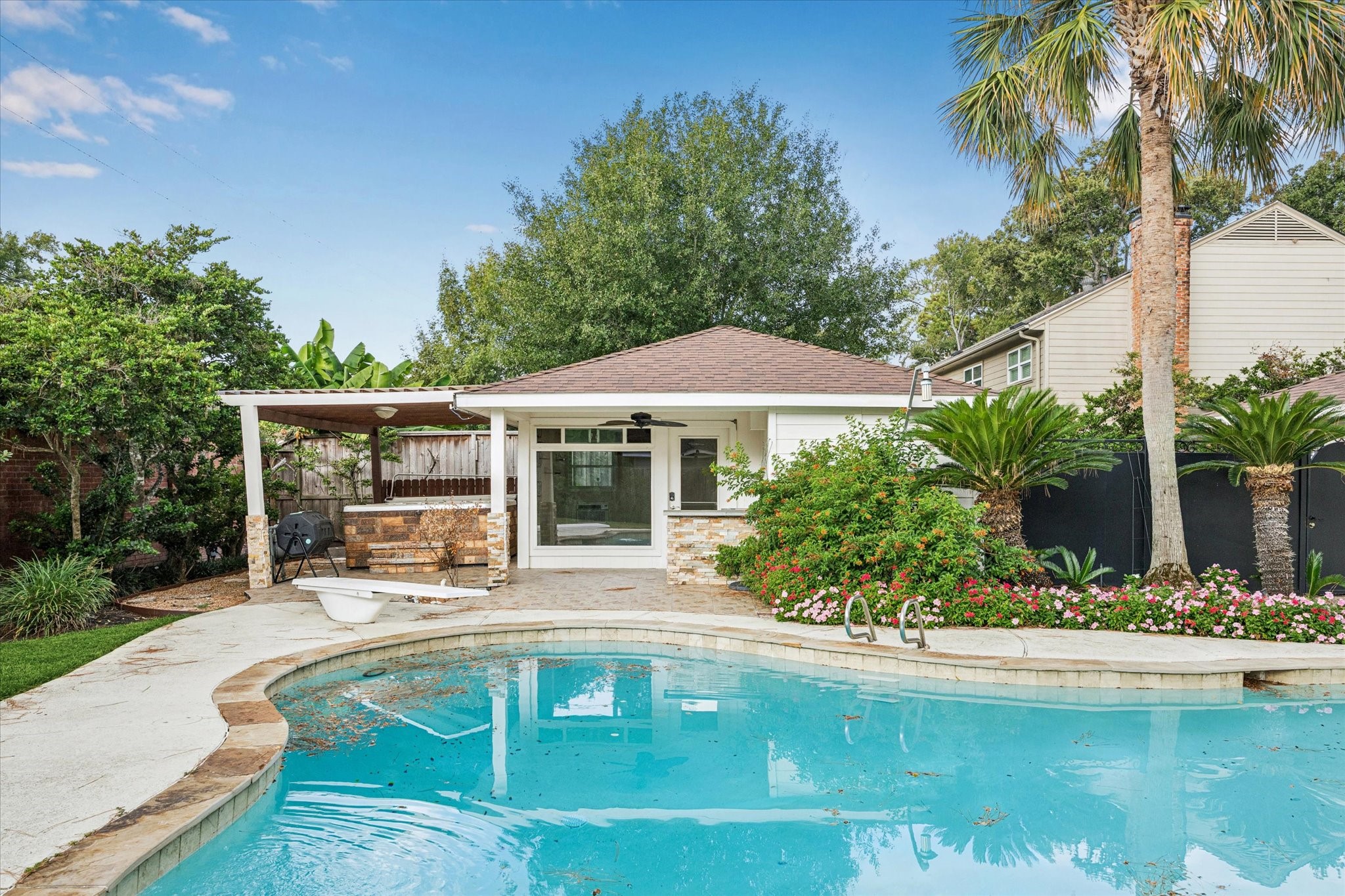 13403 Taylorcrest Road Houston, TX 77079 - Photo 27 of 38 a house with swimming pool in front of it