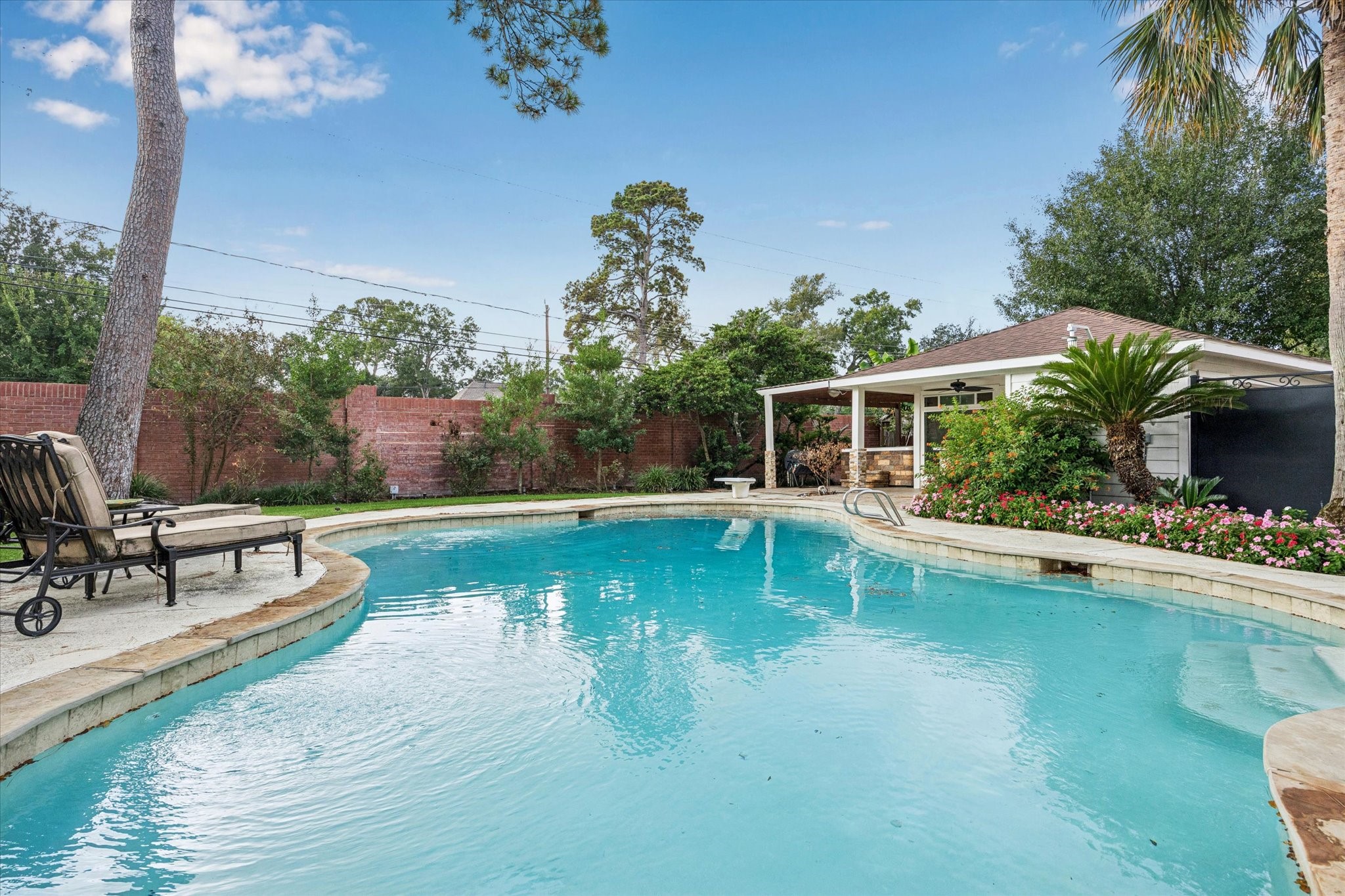 13403 Taylorcrest Road Houston, TX 77079 - Photo 28 of 38 a view of a swimming pool with a patio