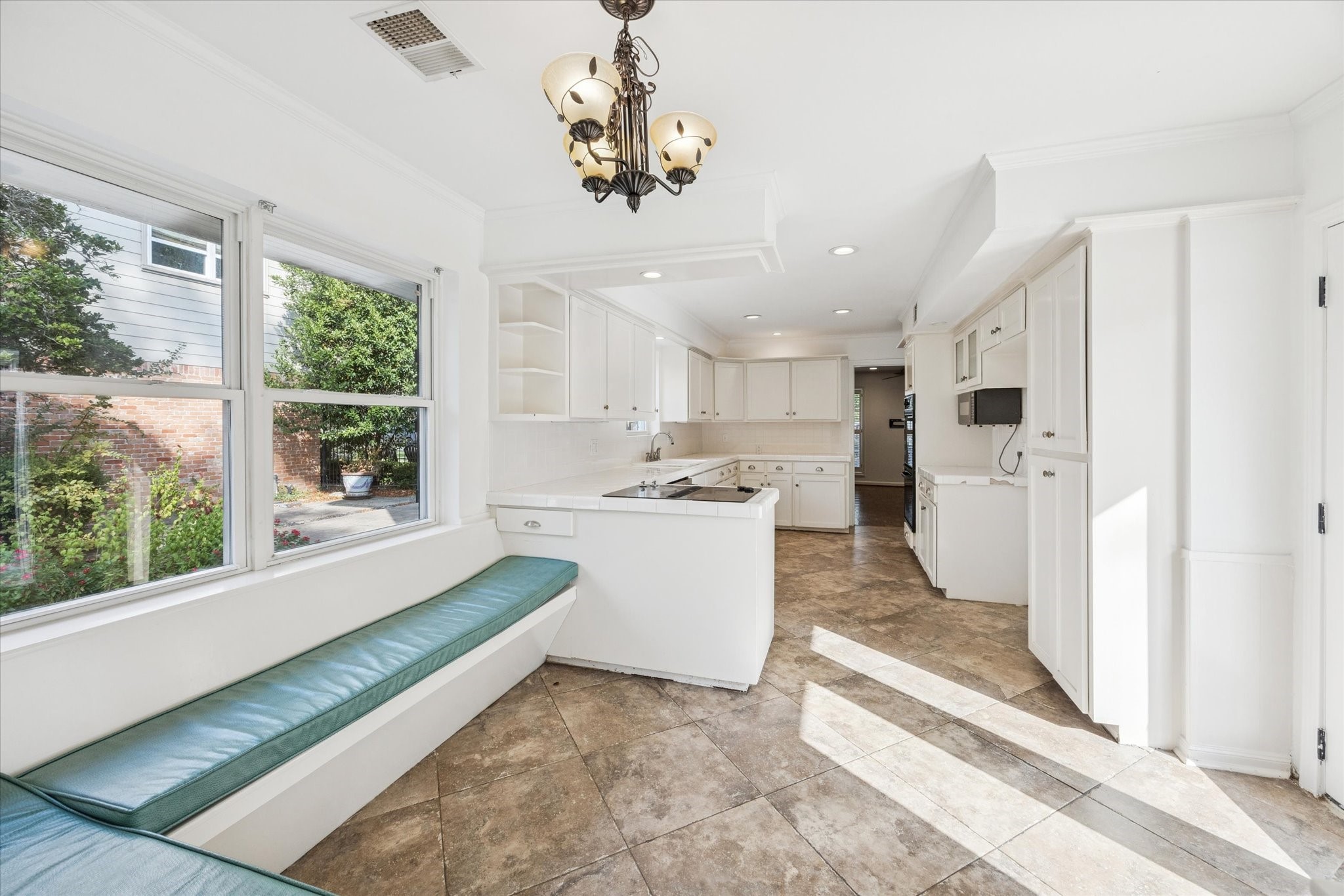 13403 Taylorcrest Road Houston, TX 77079 - Photo 7 of 38 a view of kitchen with refrigerator and window