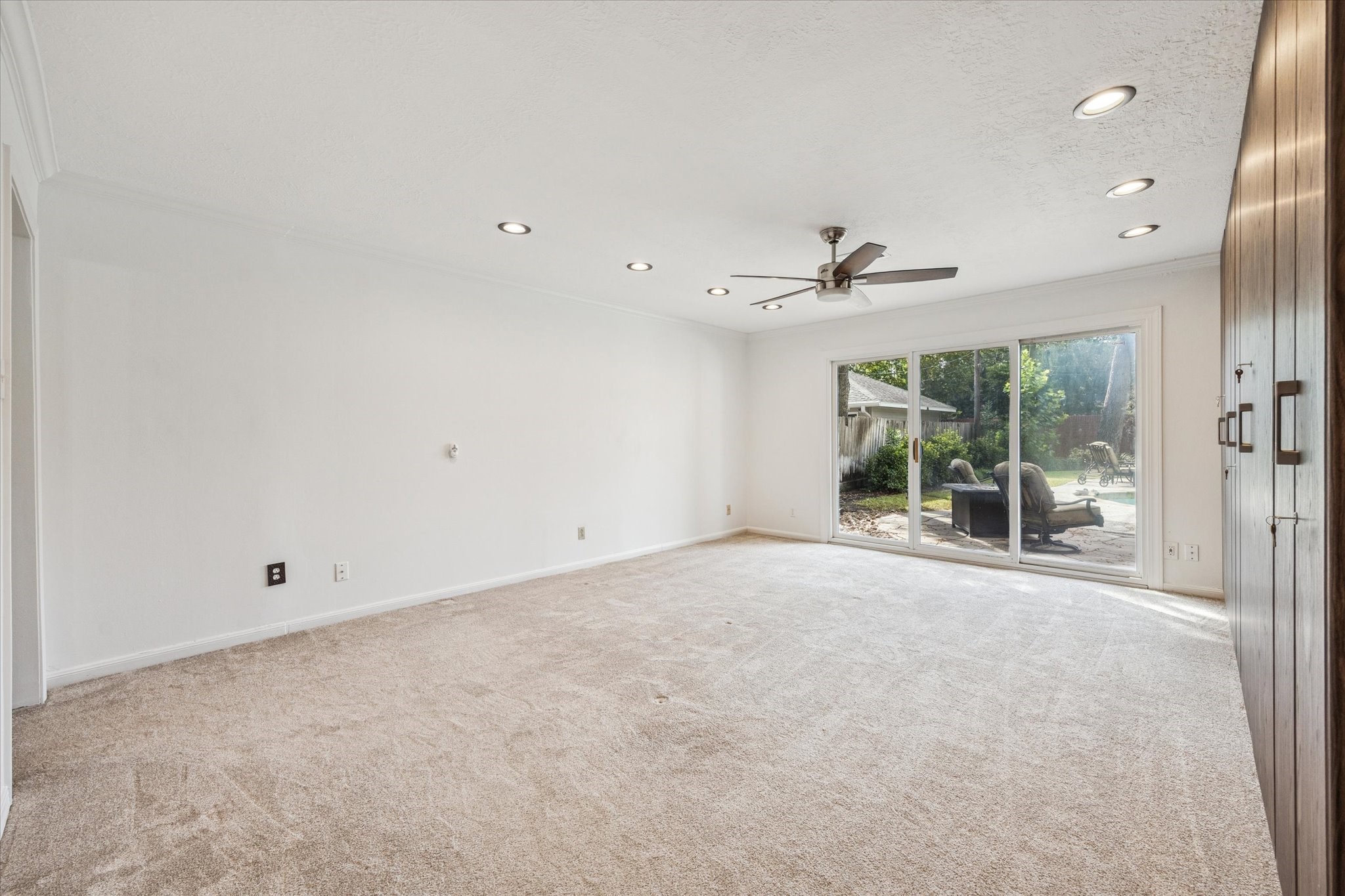 13403 Taylorcrest Road Houston, TX 77079 - Photo 9 of 38 a view of a livingroom with a ceiling fan and window