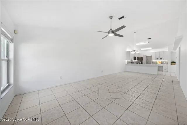 a view of a livingroom with furniture