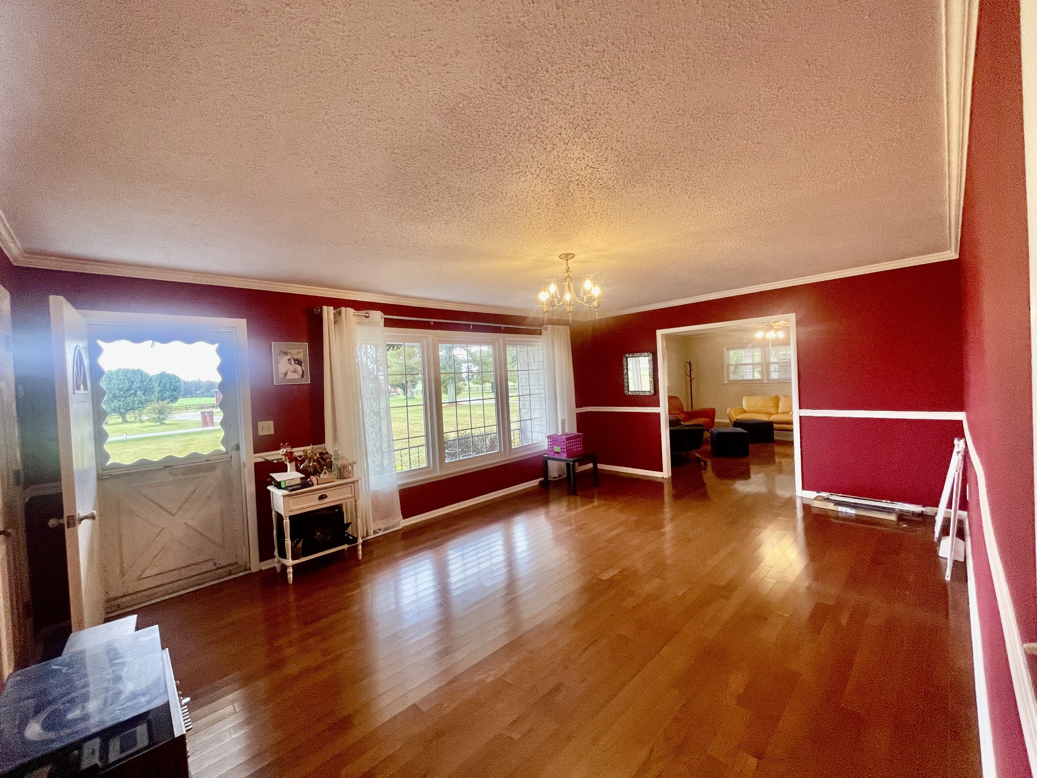 858 Ethridge Red Hill Road Lawrenceburg, TN 38464 - Photo 11 of 46 a living room with furniture and a wooden floor
