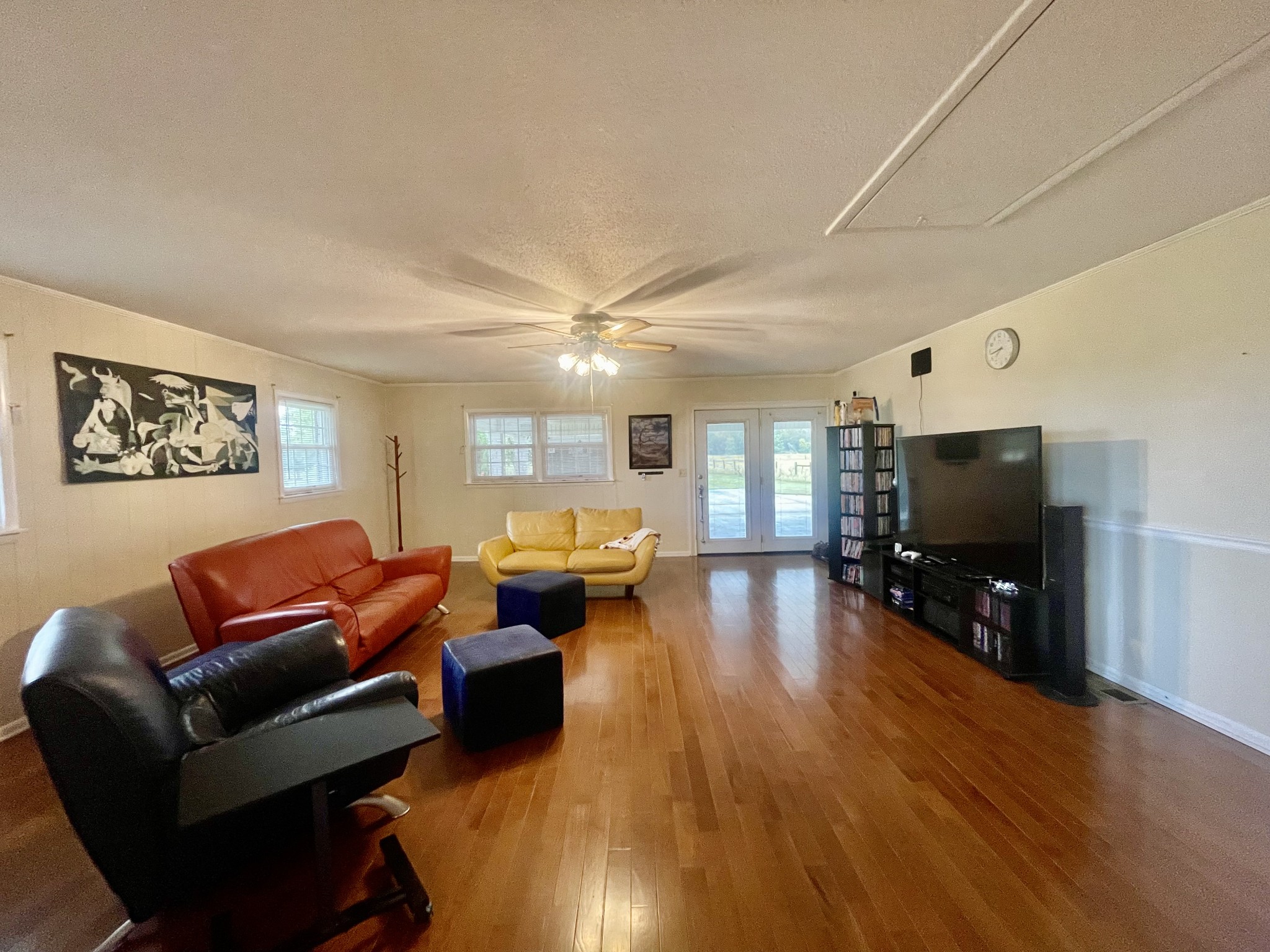 858 Ethridge Red Hill Road Lawrenceburg, TN 38464 - Photo 12 of 46 a living room with furniture and a flat screen tv