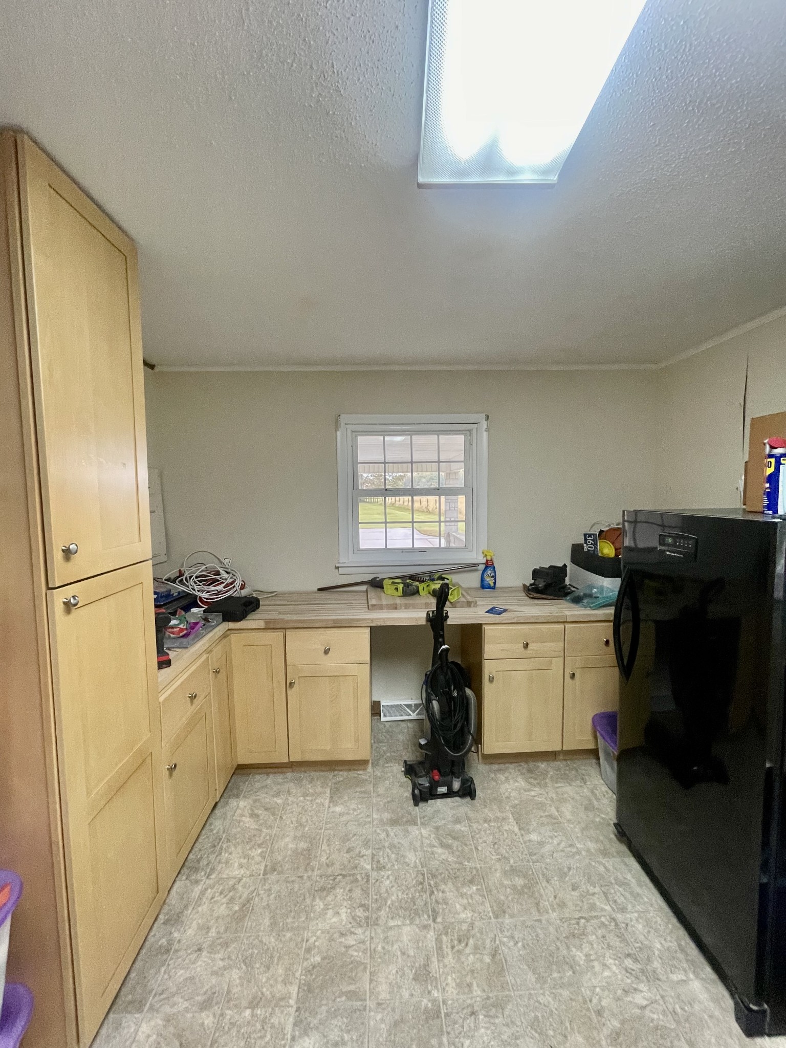 858 Ethridge Red Hill Road Lawrenceburg, TN 38464 - Photo 19 of 46 a kitchen with a refrigerator and a stove
