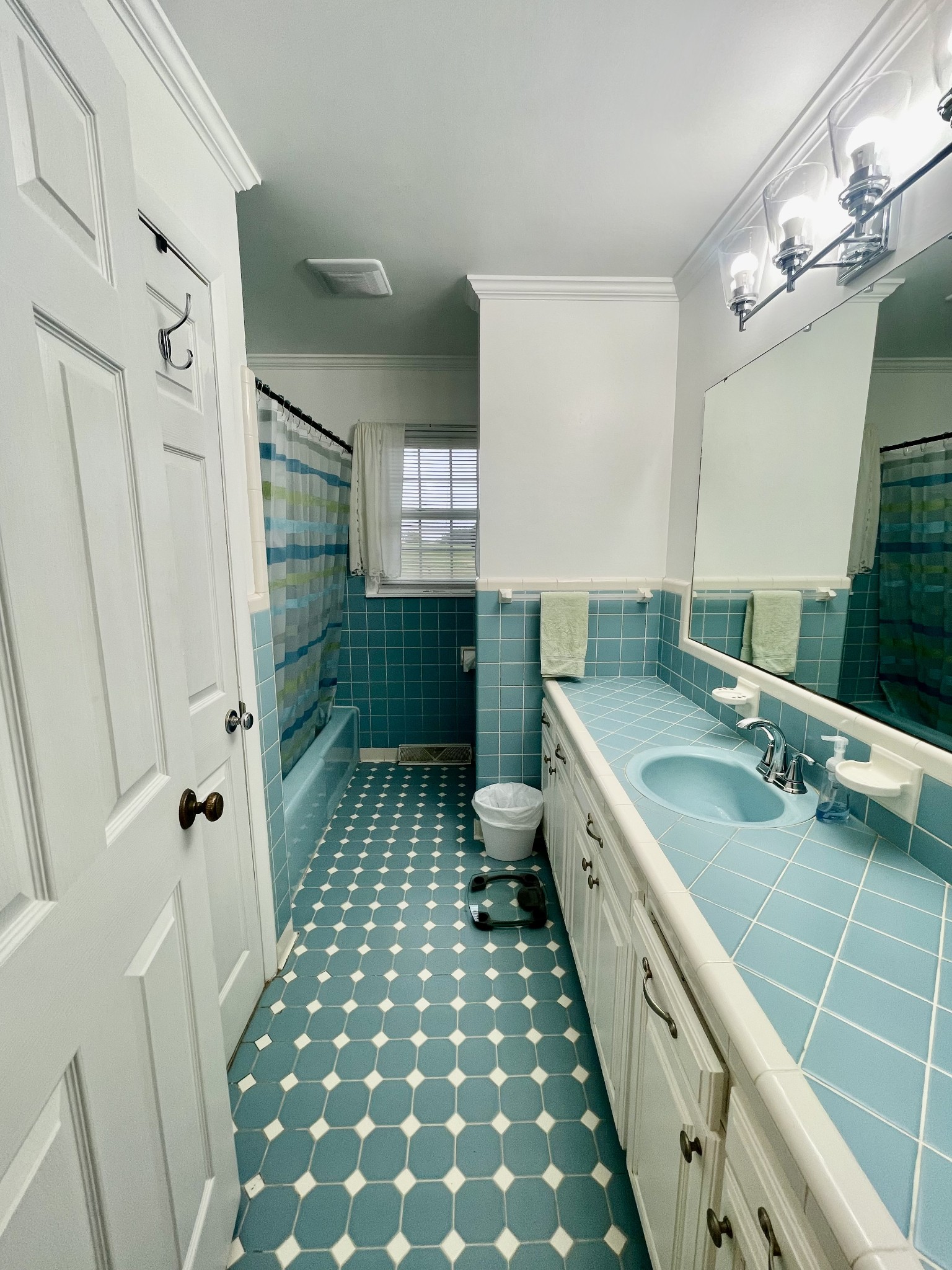 858 Ethridge Red Hill Road Lawrenceburg, TN 38464 - Photo 29 of 46 a bathroom with a double vanity sink toilet and shower