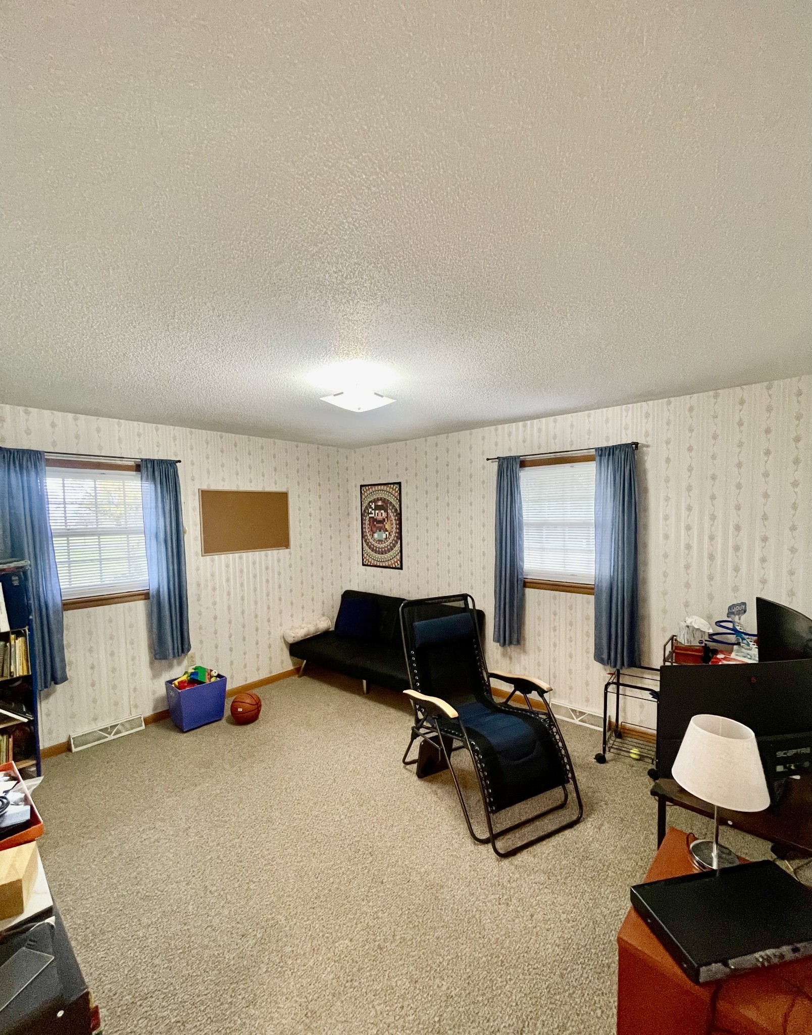 858 Ethridge Red Hill Road Lawrenceburg, TN 38464 - Photo 31 of 46 a living room with furniture gym equipment and a window