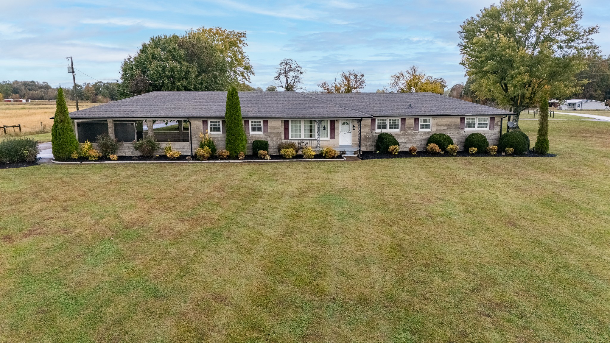 858 Ethridge Red Hill Road Lawrenceburg, TN 38464 - Photo 41 of 46 a front view of a house with a garden