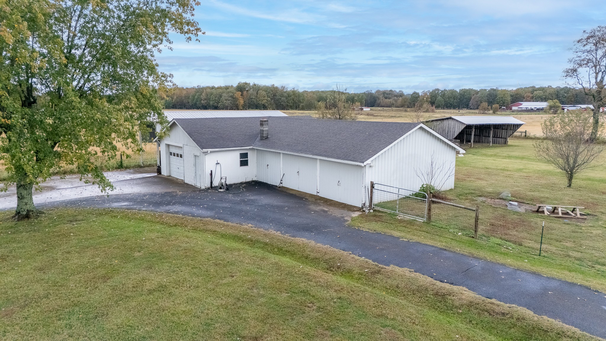 858 Ethridge Red Hill Road Lawrenceburg, TN 38464 - Photo 6 of 46 an aerial view of a house with a yard