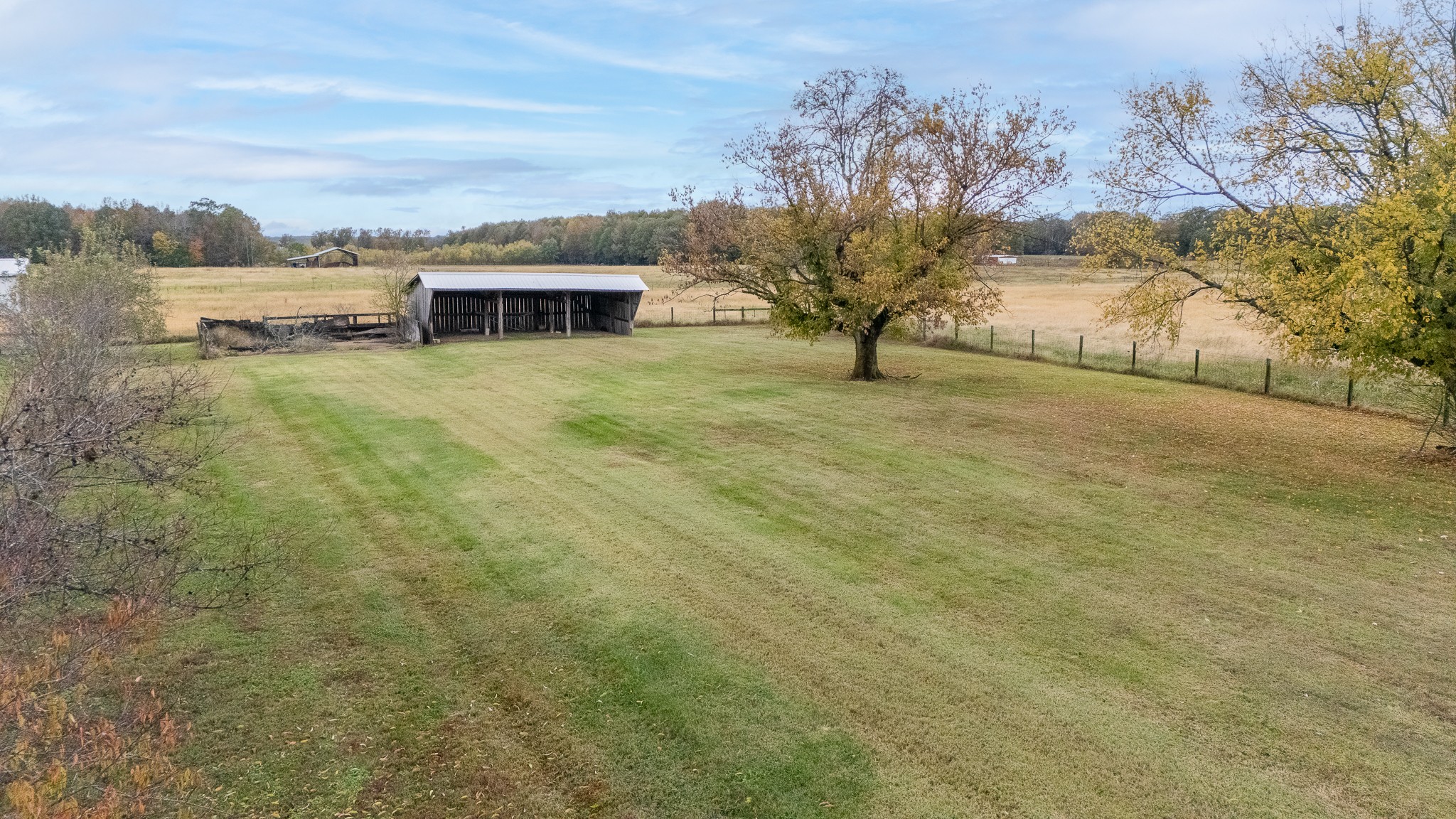 858 Ethridge Red Hill Road Lawrenceburg, TN 38464 - Photo 9 of 46 a view of a lake with a mountain in the back