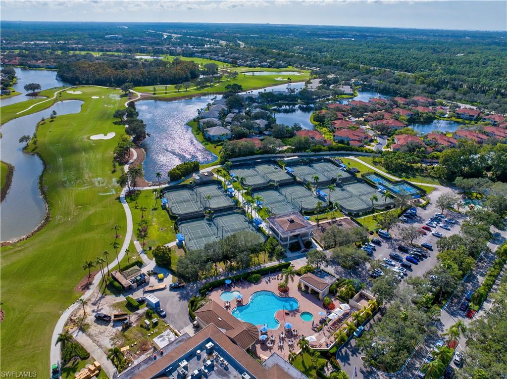6010 Chardonnay Lane, Unit 304 Naples, FL 34119 - Photo 22 of 29 an aerial view of a house with a garden