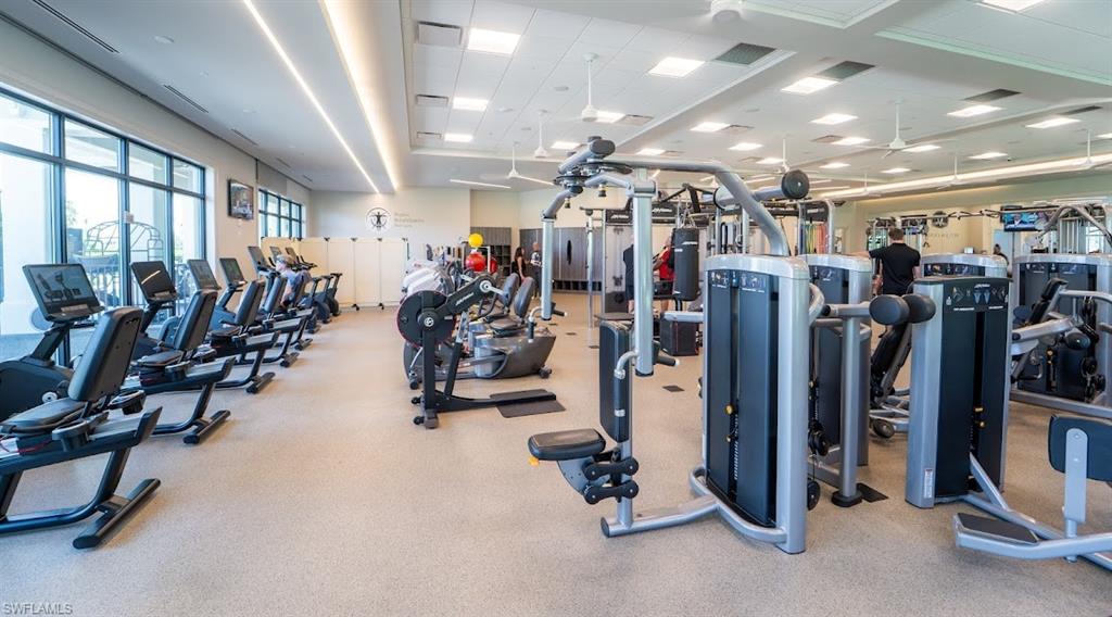 6010 Chardonnay Lane, Unit 304 Naples, FL 34119 - Photo 26 of 29 a view of a room with gym equipment