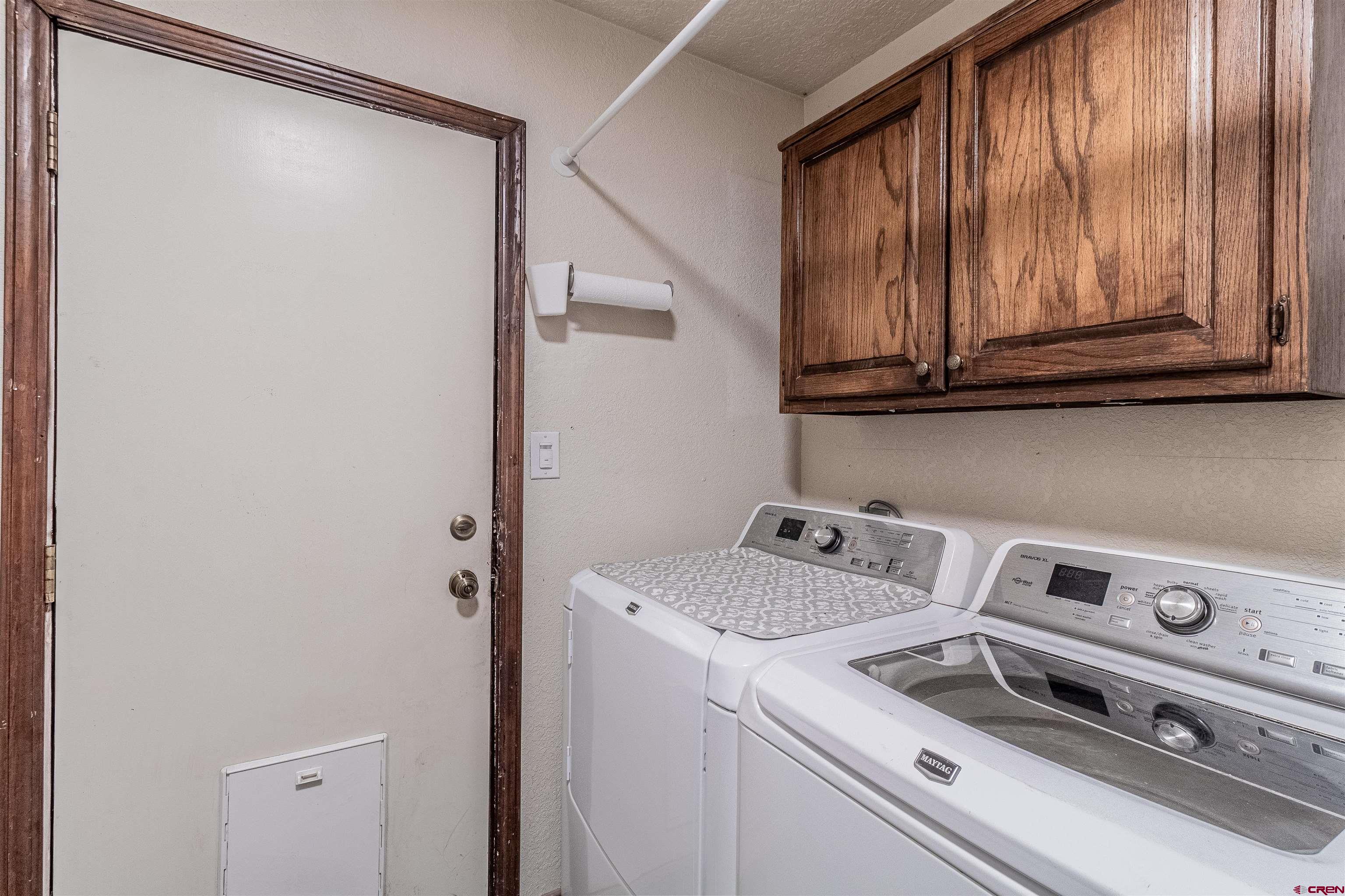 27 Road 3025 Aztec, NM 87410 - Photo 14 of 45 a utility room with dryer and washer